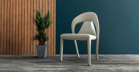 Solace Series Dining Chair Upholstered in Leather with Steel Legs and an Open Back Design